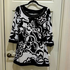 Great Black and White tunic..beaded neckline